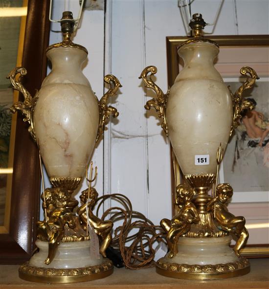 A pair of alabaster and gilt metal table lamps